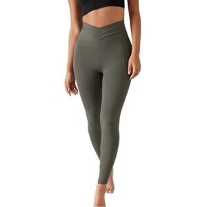 Athleta Salutation Stash Wrap Tight leggings cutouts pockets Hematite Grey Sz LP